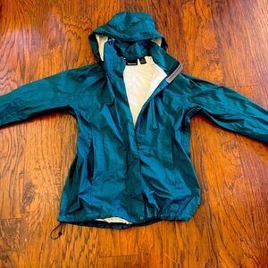 Women’s Green Marmot Windbreaker size M.